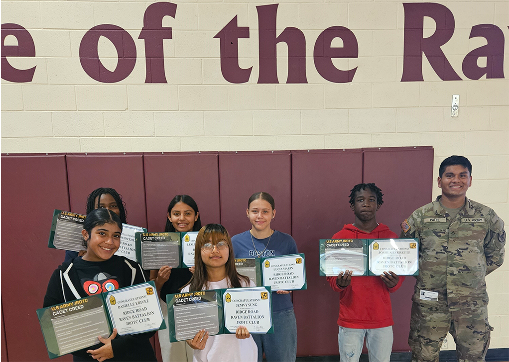 Middle School JROTC Club Members Show off their Completion Certificates.