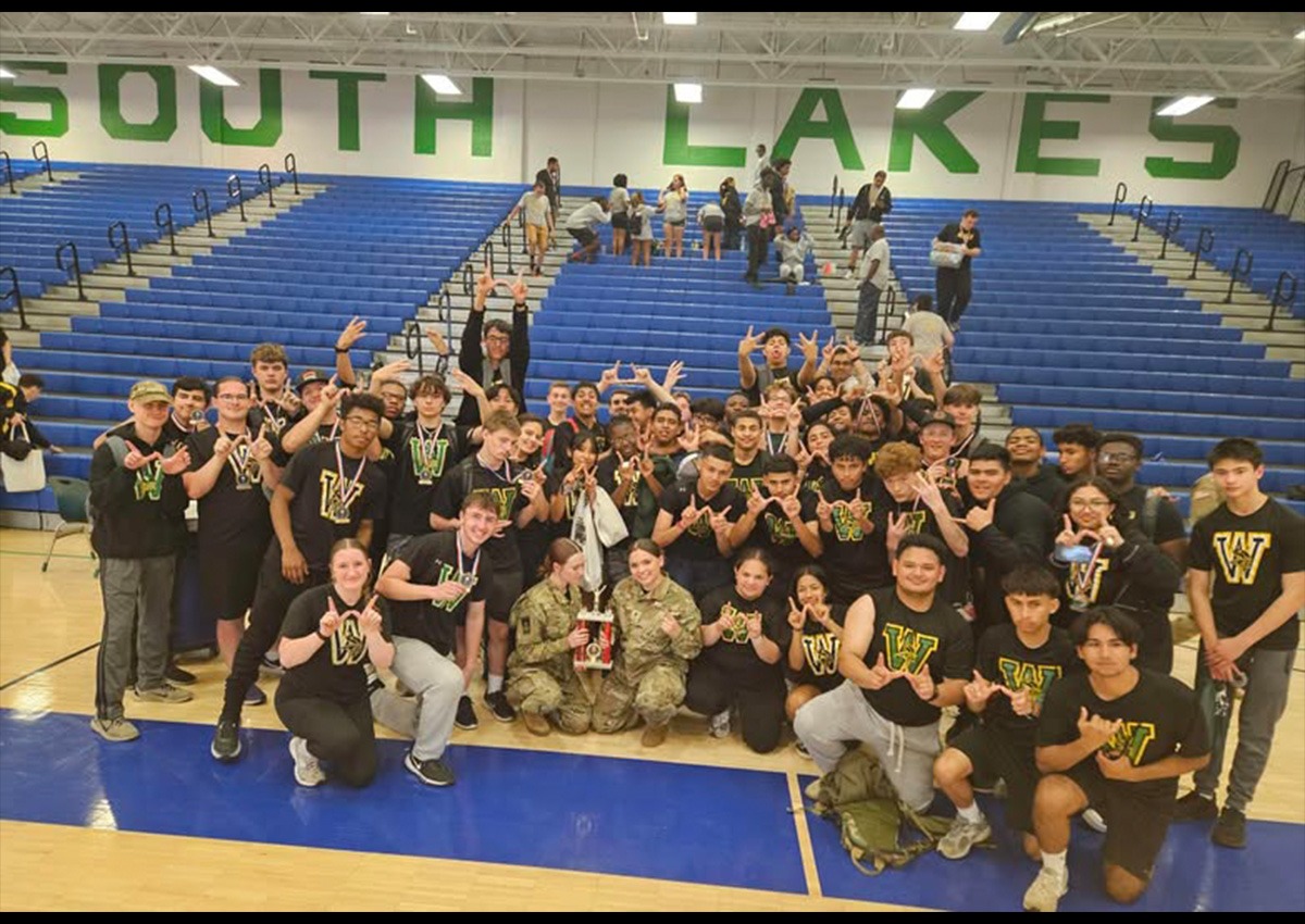 Woodbridge JROTC Viking Battalion pose after receiving the First Place Trophy for Sports Day Competition.