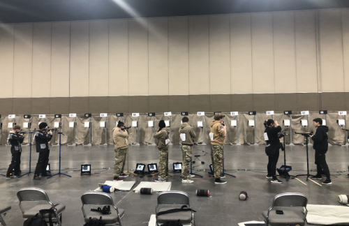 Austin E Lathrop HS, AK Army JROTC team in standing position shooting sporter